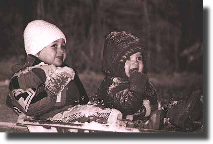 Alea and Breck sledding